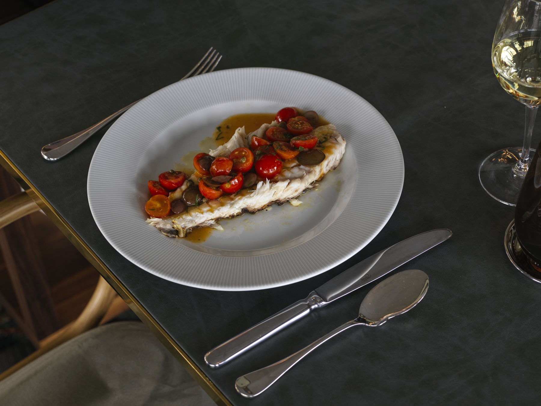 amare fish dish with tomatoes
