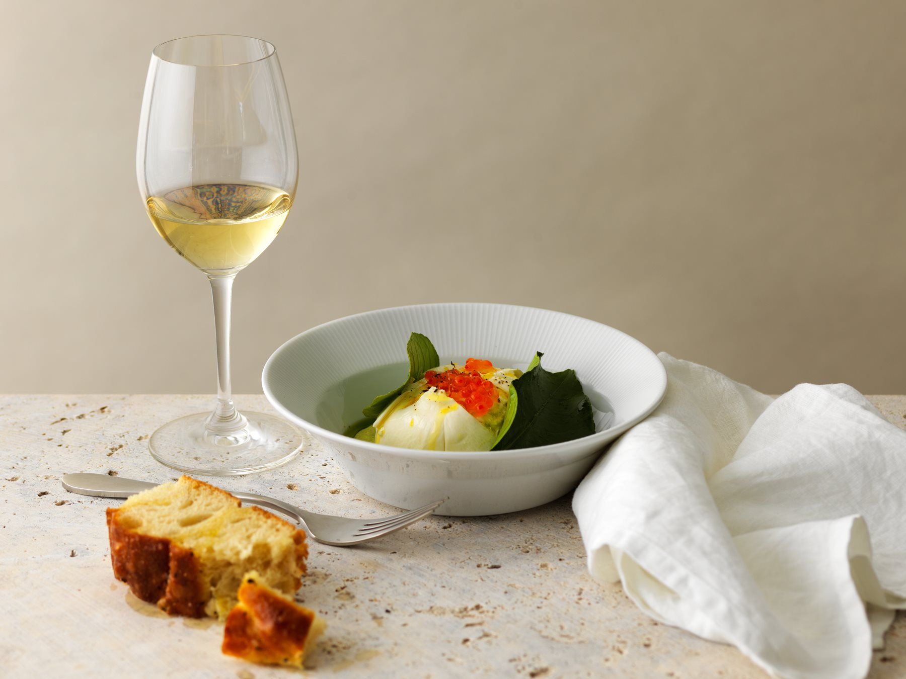 amare burrata dish with glass of white wine

